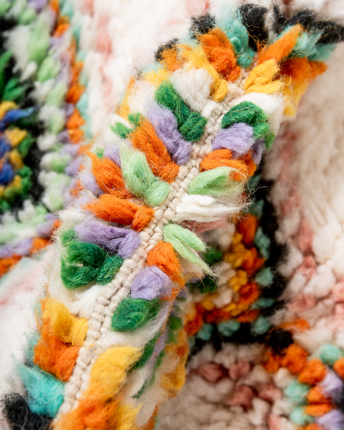 Modern, designer, handcrafted Berber rug from Morocco. Beniourain carpet with beautiful colours and patterns and fluffy wool texture.